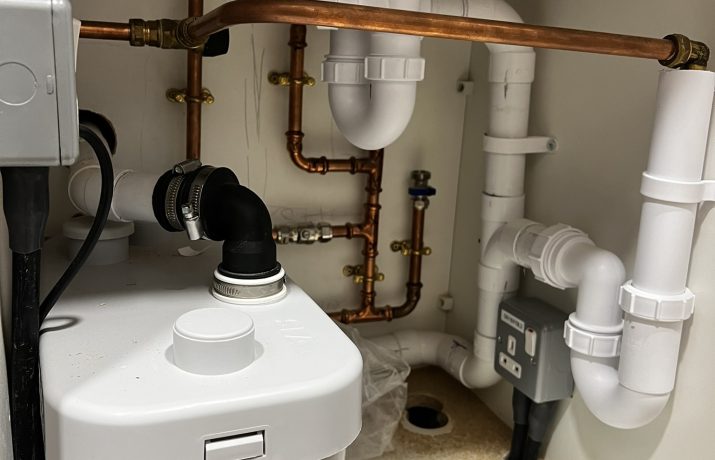 plumbing pipes under sink